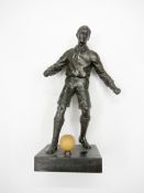 A spelter footballer,
replacement ball on base, 25.5cm., 10in.

Provenance: Torino Olympic Stadium