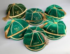 A green Republic of Ireland international cap season 1985-86,
with "5" in a shield representing