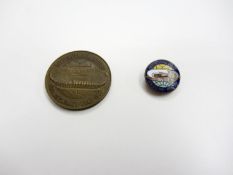 A commemorative coin and pin for the Chile 1962 World Cup finals,
sold together with an Italian F.A.