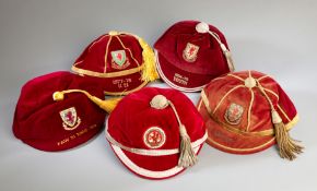 A David Giles red Wales international cap season 1982-83,
sold together with an official F.A.