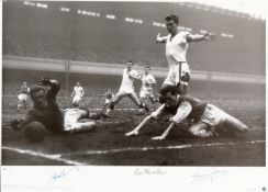 A signed b&w photographic print of the last game played on English soil by the Busby Babes before