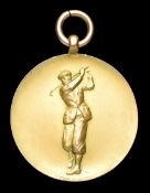 A gold participant's medal for the Great Britain v U.S.A. international golf match organised by