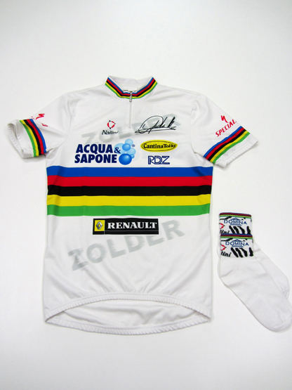 A Mario Cipollini signed cycling World Champion 'rainbow' jersey,
together with a pair of socks (3)