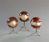 Three silver-mounted cricket balls presented to Alf Pollard for bowling achievements in Lancashire