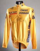 A 1994 Tour de France yellow jersey signed by Miguel Indurain & Rolf Sorensen,
with a COA from T.S.