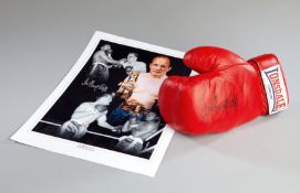 A Sir Henry Cooper signed boxing glove & photographic print,
a left-hand Lonsdale glove signed in