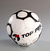 A football signed by Pele,
signed at the World Travel Market in London in 1985 when Pele was an