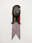 A Melbourne 1956 Olympic Games official's badge,
the ribbon inscribed N.O.C.

Provenance: Torino