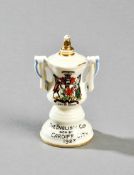 A Carlton China model of the F.A. Cup trophy commemorating the victory of Cardiff City in 1927,
with