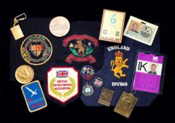 A large collection of miscellaneous medals, badges & commemorative coins relating to the career of