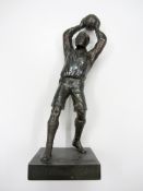 A spelter footballer,
modelled taking a throw-in, 29cm., 11 1/2in. 

Provenance: Torino Olympic