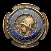 A 1908 London Olympic Games judge's badge,
by Vaughton of Birmingham in silvered bronze with the