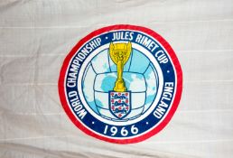 A smaller size [to the previous lot] official 1966 World Cup stadium flag,
printed World Cup logo to