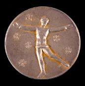 A St Moritz 1928 Winter Olympic Games gold first place winner's medal,
in goldplated silver,