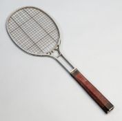 A Birmingham Aluminium Co. "Birmal" racquet 1920s,
Patent No.230523, piano wire stringing, a