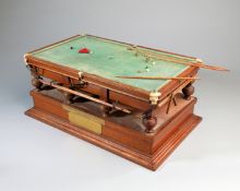 A superb miniature scale model of a snooker table complete with balls and various accessories,
white
