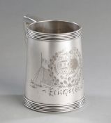 A Fine Tiffany & Co. lawn tennis prize tankard,
with highly decorative engraving showing a victory