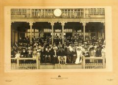 A fine photograph featuring W.G. Grace centre-front of a large smartly dressed gathering in a