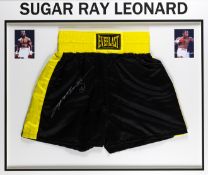 Sugar Ray Leonard signed boxing trunks,
signature in silver marker pen, mounted in a frame under