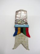 A London 1948 Olympic Games official's badge
silvered with bar enamelled OFFICIAL, and the light