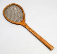 A Henry Malings of Woolwich tilt head lawn tennis racquet 1870s,
the convex wedge stamped with