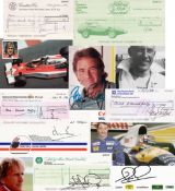 Cheques signed by James Hunt, Barry Sheene, Stirling Moss, Derek Bell and Nigel Mansell,
each from