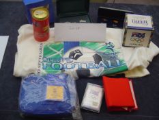 A collection of souvenirs produced for the Sydney 2000 Olympic Games,
T-shirt, boxer shorts, mugs,