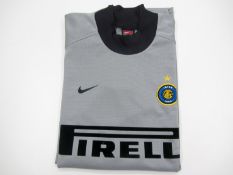 A collection of official FC Inter player-issue training kit,
Comprising: i) a FC Inter goalkeeper'