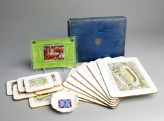 A Football Association 1966 World Cup table mats & coasters boxed set,
with aerial views of all