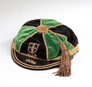 A Northampton Rugby Club cap dated 1936,
green & black, crest, inscribed R.F.U., 1936, the