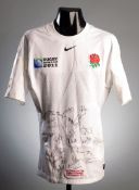 A team-signed Tom Palmer white England No.5 2011 Rugby World Cup shirt,
25 signatures in black