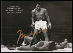 A Muhammad Ali v Sonny Liston postcard signed by Ali,
signature in gold marker pen, with COA (2)