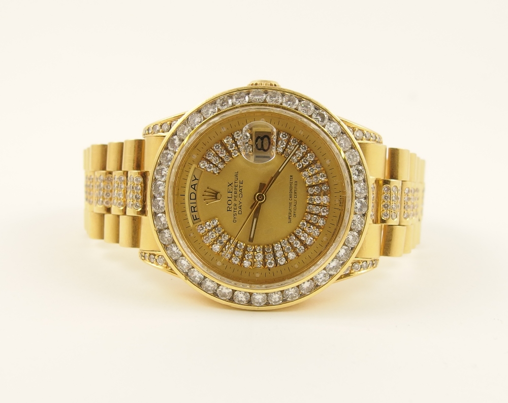 A diamond set 18ct Rolex Oyster Perpetual DayDate the gold coloured dial marked superlative