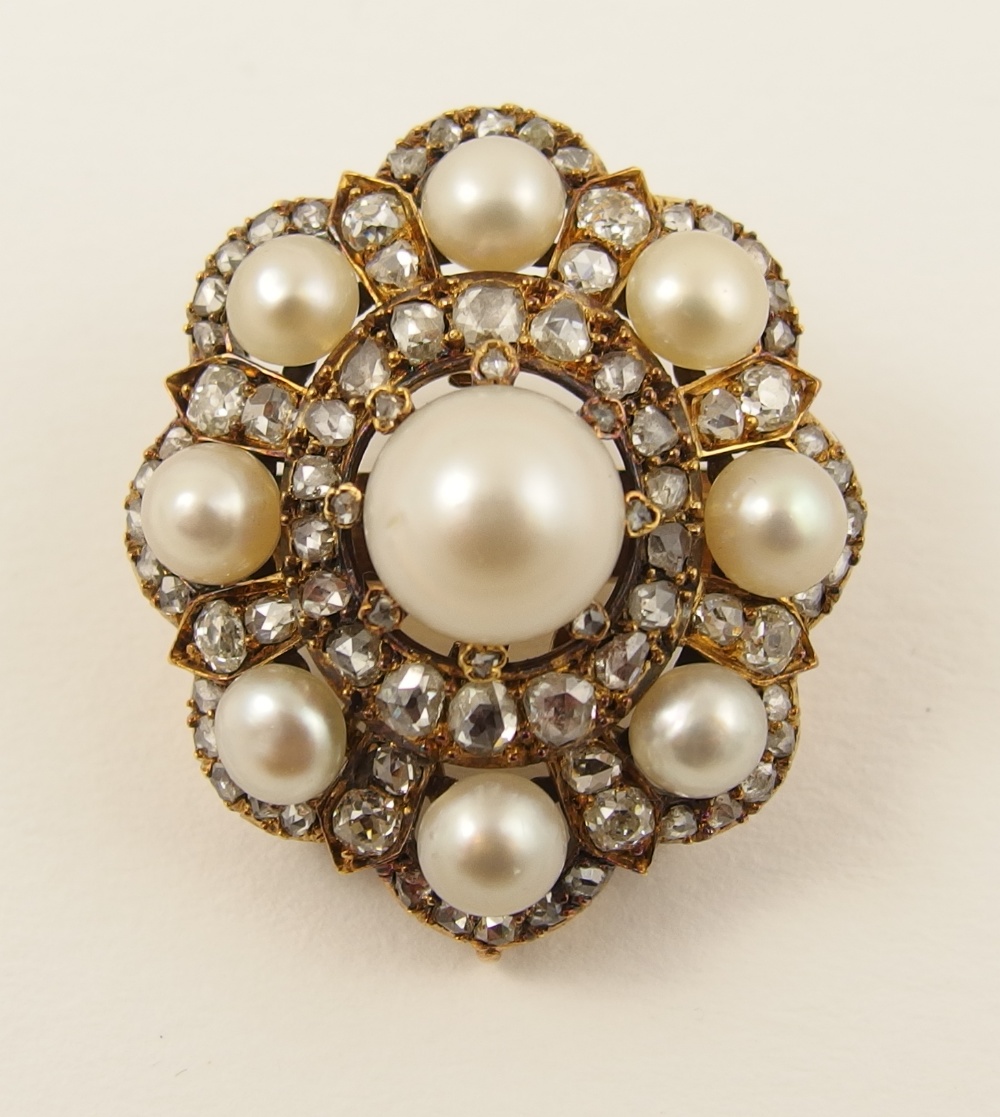 A Georgian pendant brooch finely hand made in yellow metal, set with button shaped pearls