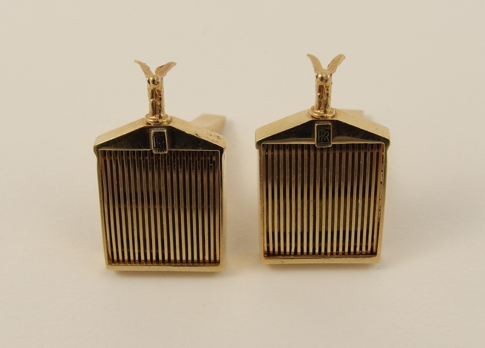 A pair of 14ct cufflinks modelled as a Rolls Royce Motor car grill, complete with a tiny spirit of