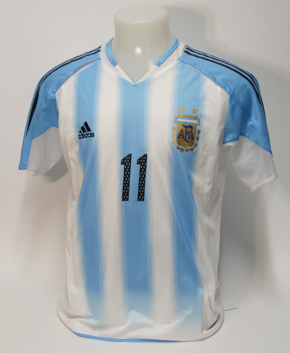 A blue and white Coppa America Argentina International short-sleeved shirt No.11, with printed badge