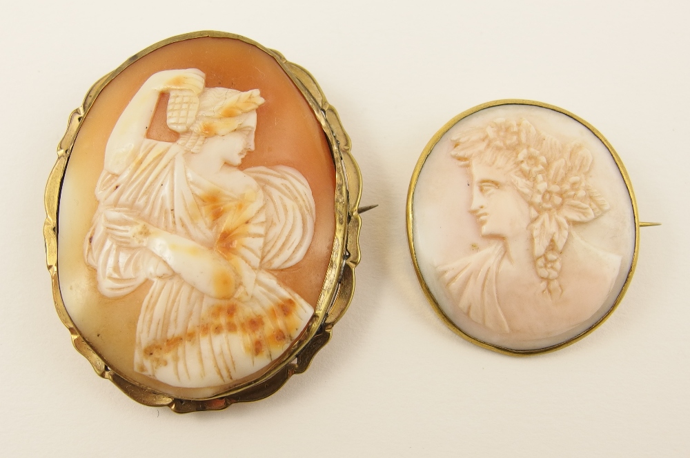 Two shell cameos a cameo of a classical maiden in decorative pinchbeck mount together with a further