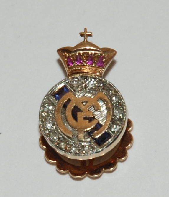 An unusual diamond and gem set Real Madrid lapel badge in original fitted case