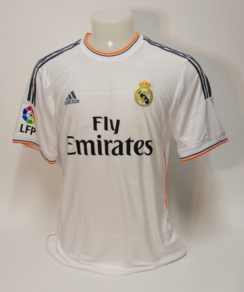 A white Real Madrid short-sleeved shirt No.7, with crew-neck collar and printed badge, the reverse