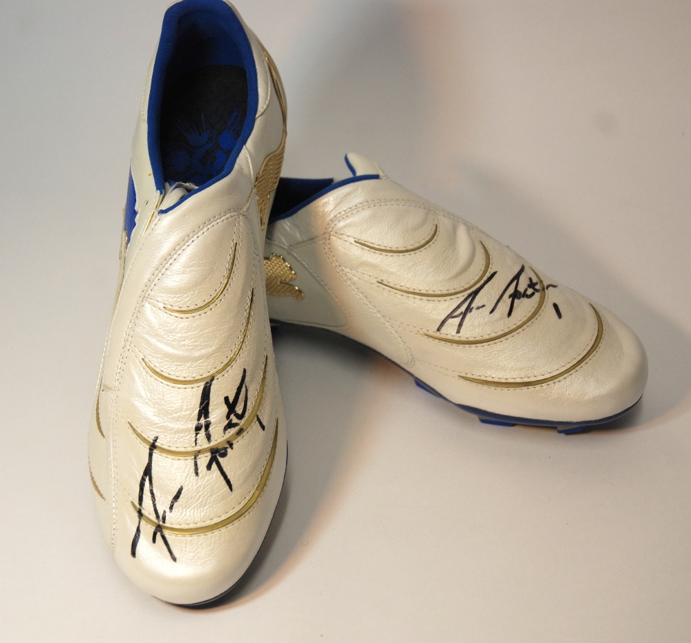 A pair of Puma PWR-C 1 match worn football boots worn by Fraser Forster, each boot autographed and