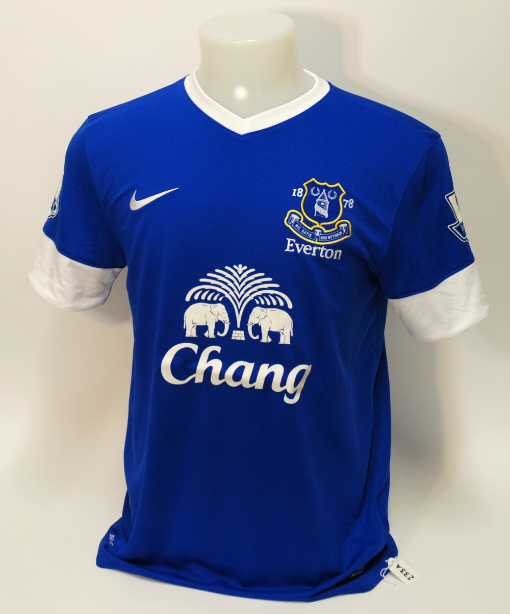 A blue Everton short-sleeved shirt No.7, with v-neck collar and embroidered badge, inscribed 1878,