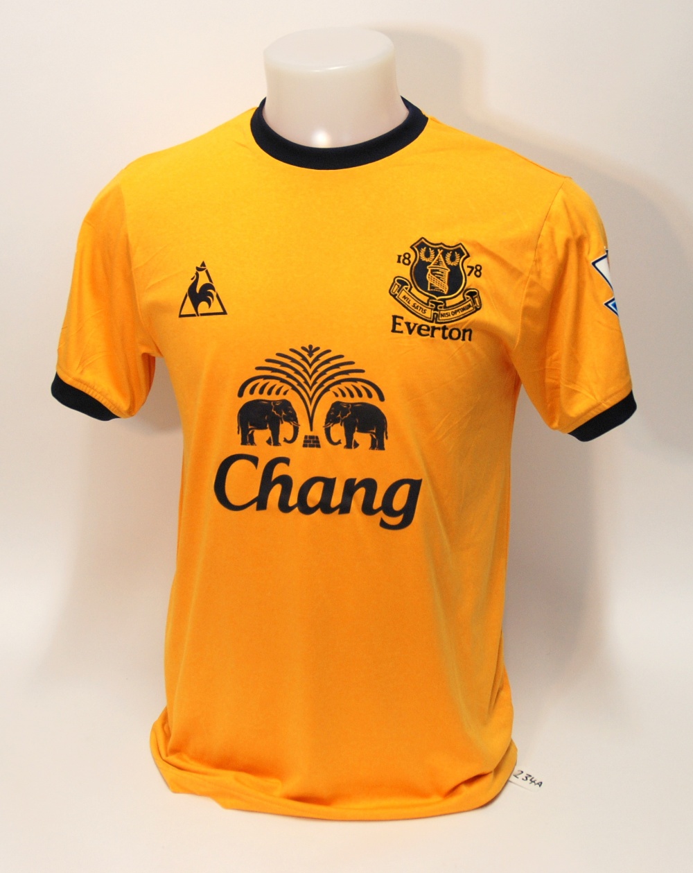 A yellow Everton short-sleeved shirt No.17, with crew-neck collar and embroidered badge, inscribed