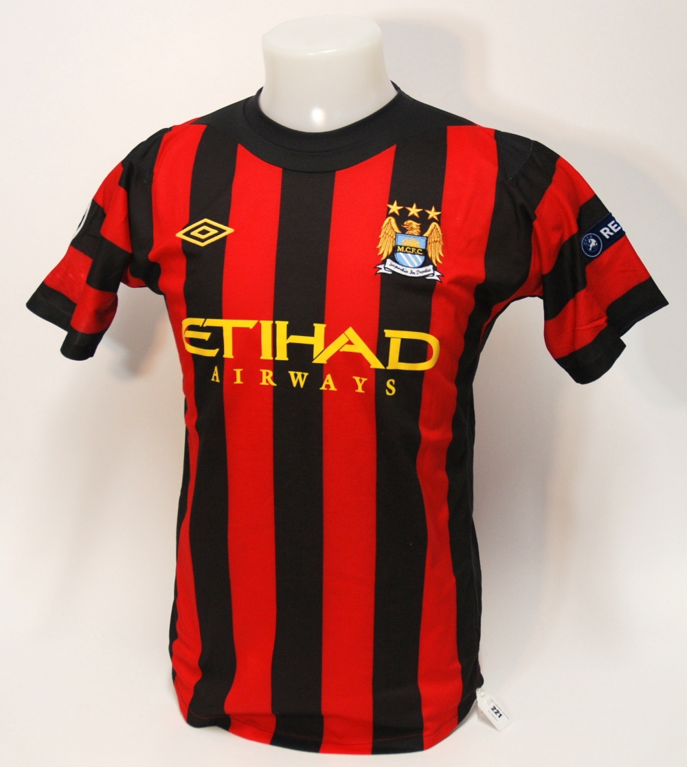 A red and Black Manchester City short-sleeved shirt No.21, with crew-neck collar and embroidered