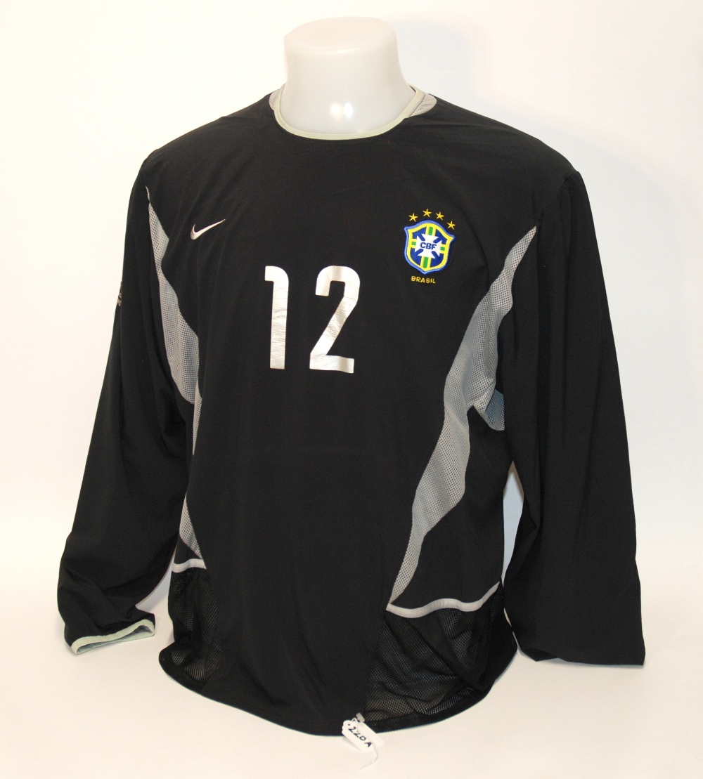 A black Brazil goalkeepers shirt No.12, with crew-neck collar and embroidered cloth badge, inscribed