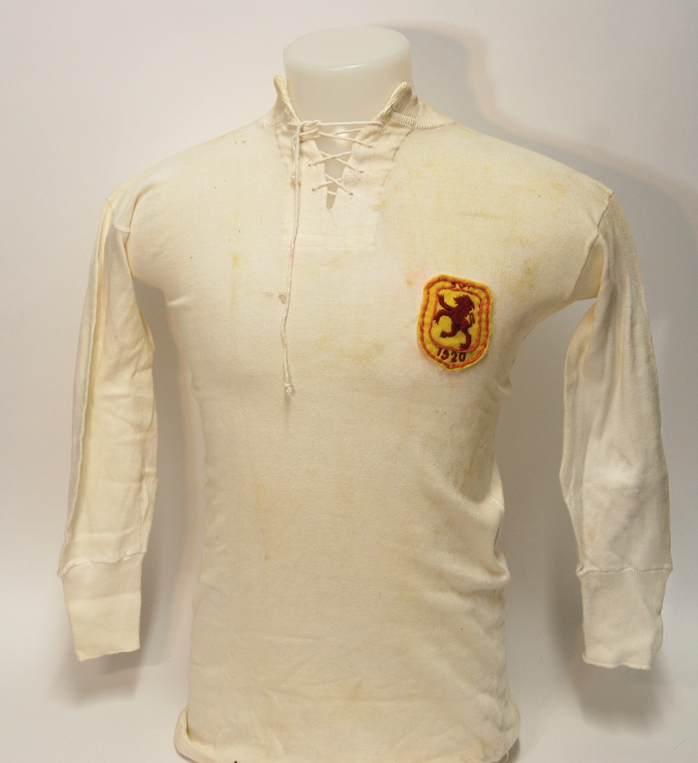 A white Scotland v. Ireland International shirt with lace-up collar and embroidered cloth badge,
