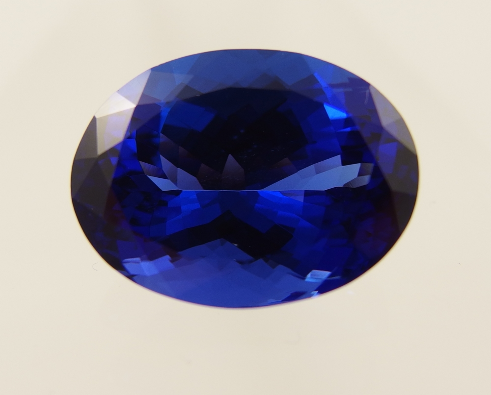 A tanzanite gemstone deep purple blue in colour, weighing in at 21cts, the dimensions are 20mm x
