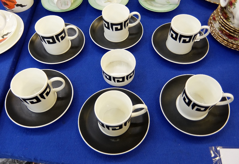 A Susie Cooper for Wedgwood porcelain black keystone coffee set comprising six coffee cups and