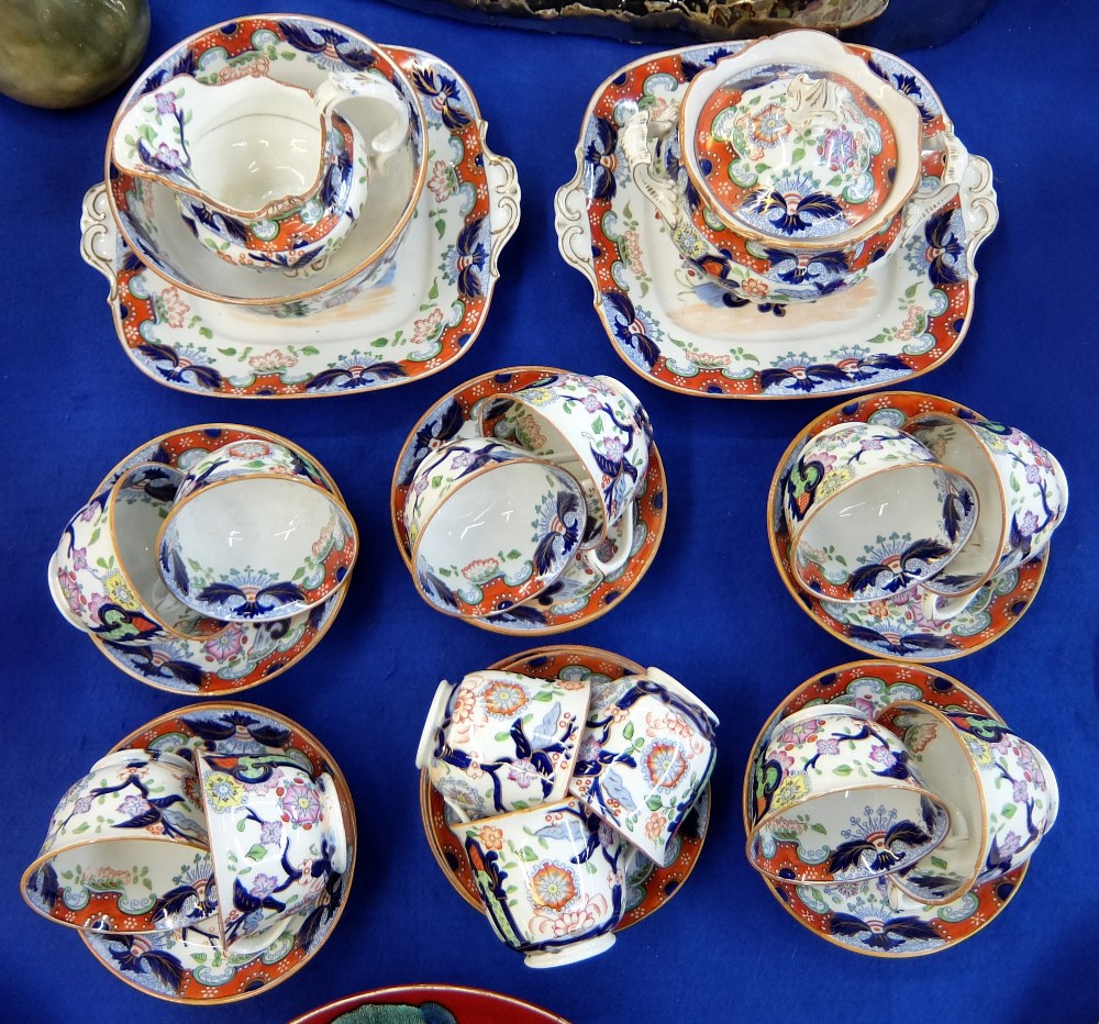 A Victorian pottery part coffee and tea service comprising ten tea cups, ten saucers, three coffee