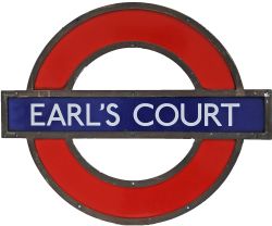 LT Station Target in shaped bronze frame EARL`S COURT. Three separate enamel sections, the name