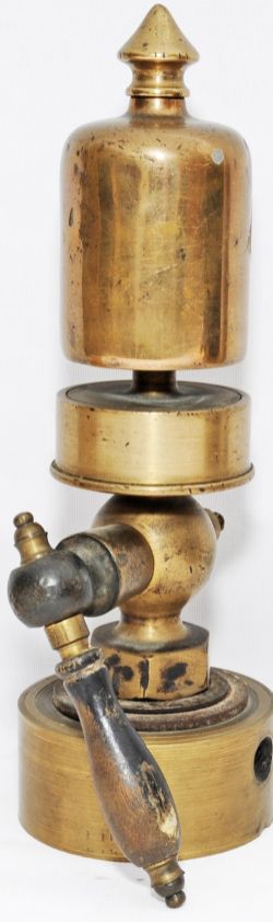 Brass Locomotive Whistle measuring 10¼" high to top of ornate finial and 2¼" diameter. It has a wood